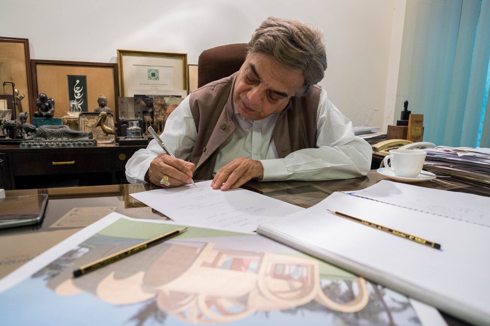 Architect Nayyar Ali Dada at work in his Lahore office of Nayyar Ali Dada & Associates. Nayyar Ali Dada is considered to be the leading and most prominent architect in Pakistan.