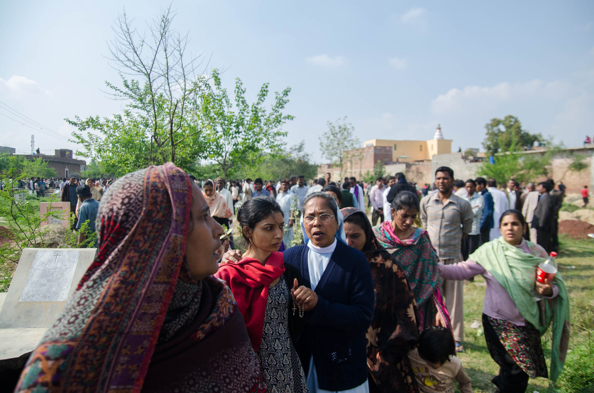 A nun comforts a woman at the funeral for those killed in a suicide attack on two churches in Lahore’s Youhanabad area.