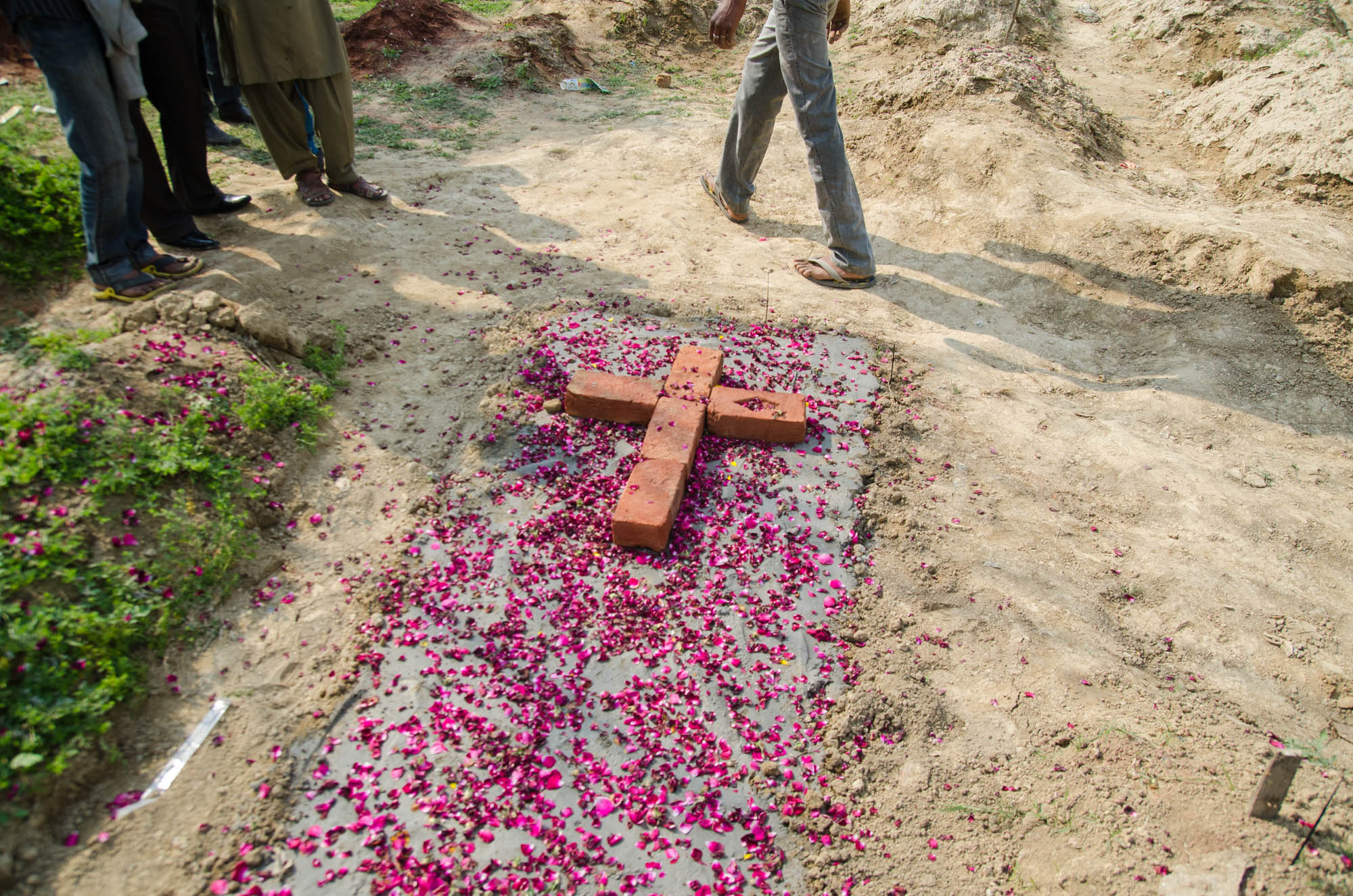  A fresh grave of a victim killed in a suicide attack in Lahore’s Youhanabad area.  