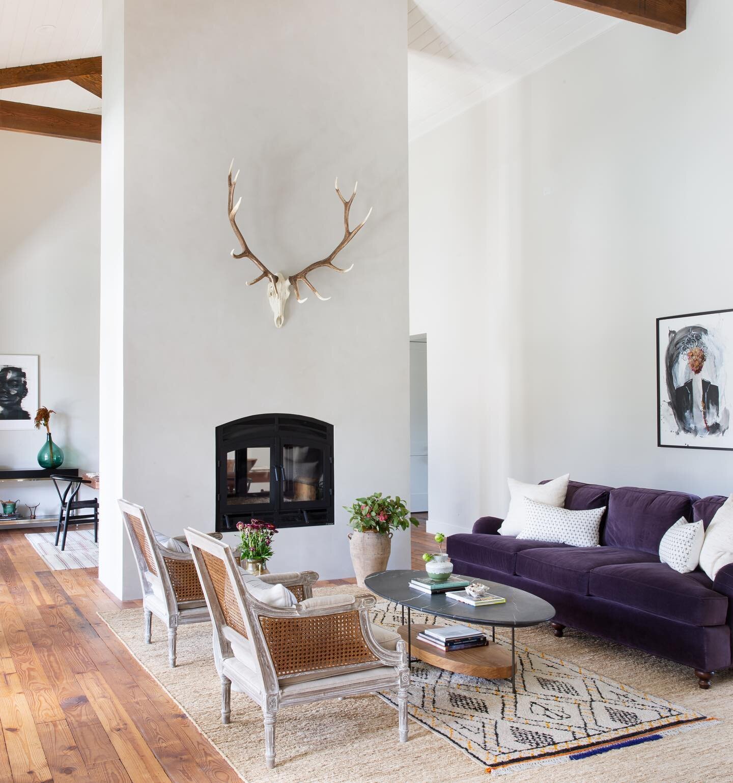 purple people eater sofa and lots of one of a kind finds in this great room // love this client and project so much 💫 photo by @mollyculverphotography #SEI2019 #florencetxfarmhouse