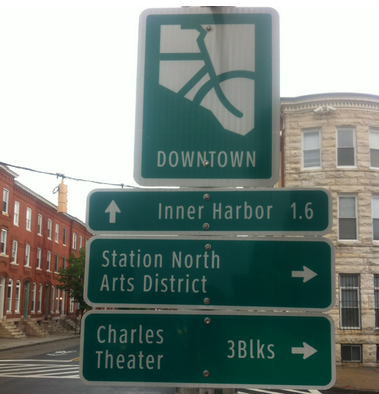 Existing bicycle wayfinding signage on Guilford Avenue (photo courtesy of BCDOT).