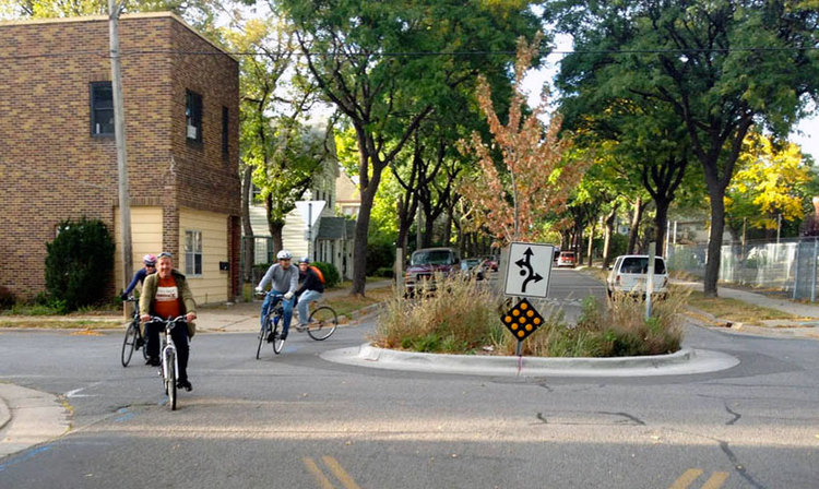 A traffic circle in Minneapolis on a similar sized street to Guilford Ave