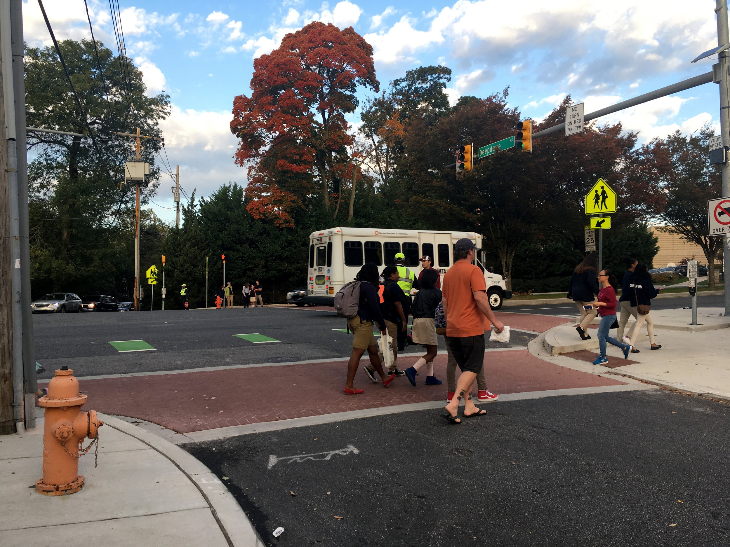 Families make use of the pedestrian infrastructure, improved during the Roland Ave Cycle Track installation