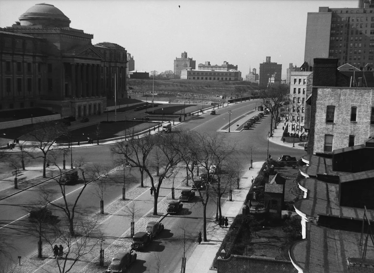 The Olmsted Designed Eastern Parkway in Brooklyn in the 1930's with a multi-use median path for people walking and biking.