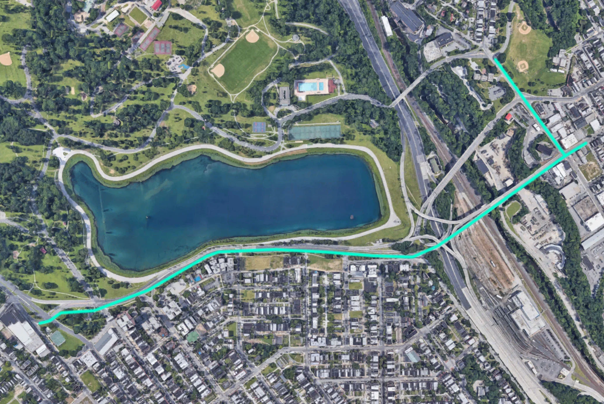 The proposed barrier-protected bike and pedestrian path route is outlined in teal above.