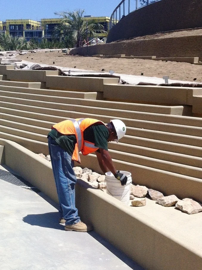 Laying the rocks down for the water feature at the Ocean Avenue entrance