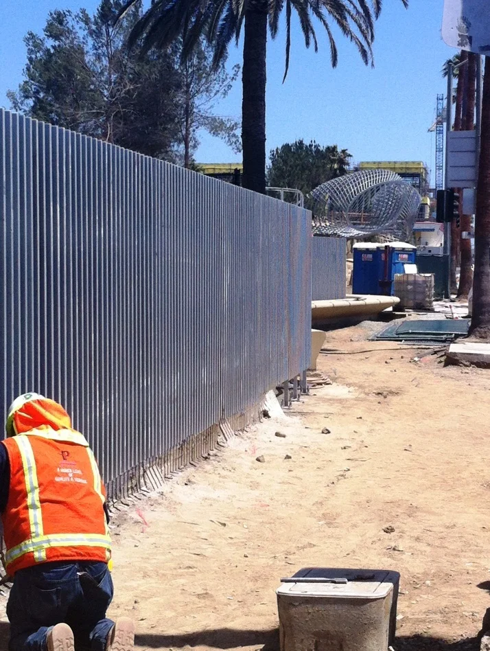 Working on the green screen along Ocean Avenue