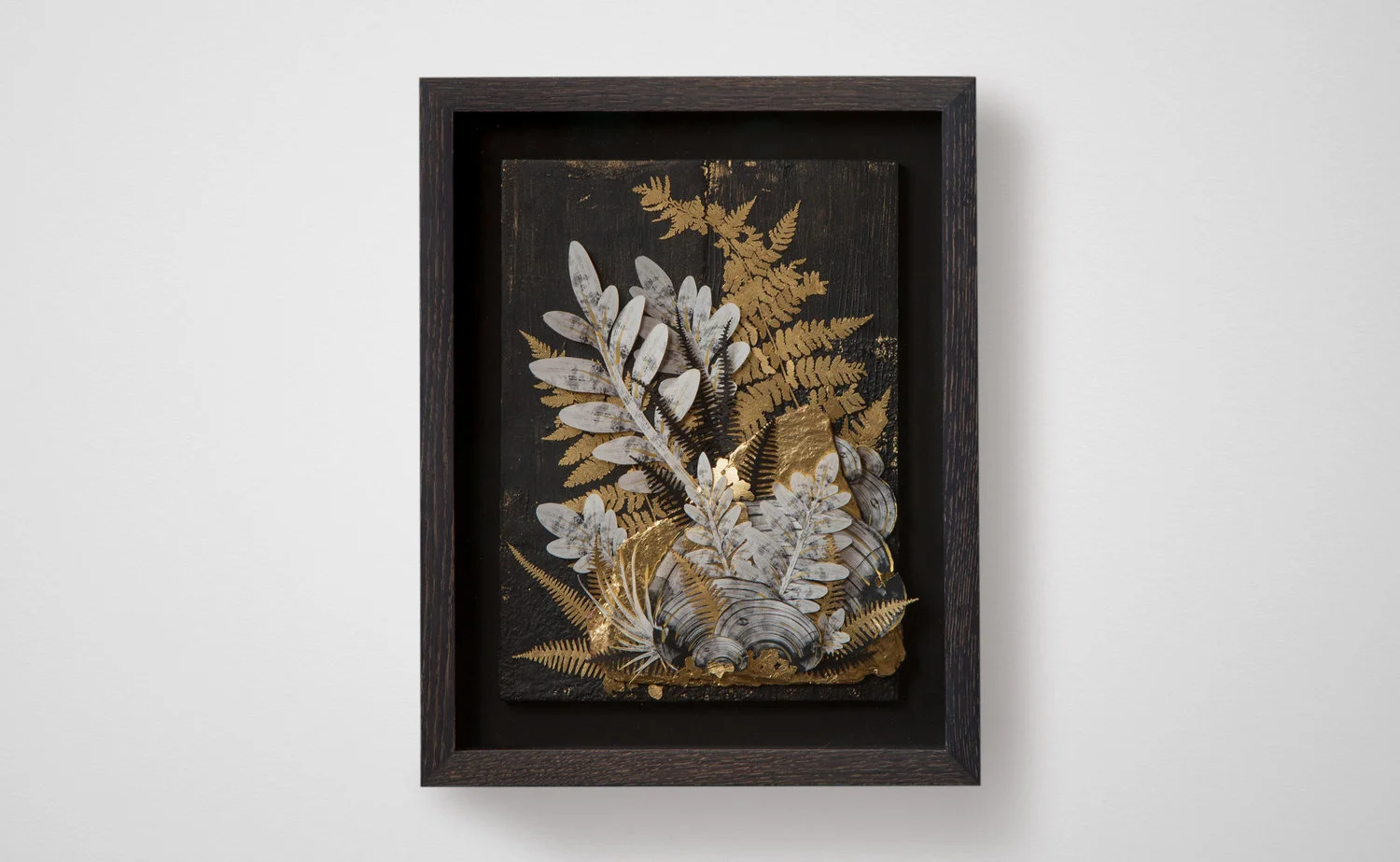  2017, Fragments Of A Forest I  C-print on rice paper, wood, rock slates, Dutch gold leaf, and acrylic paint. 5 x 9 inches. 