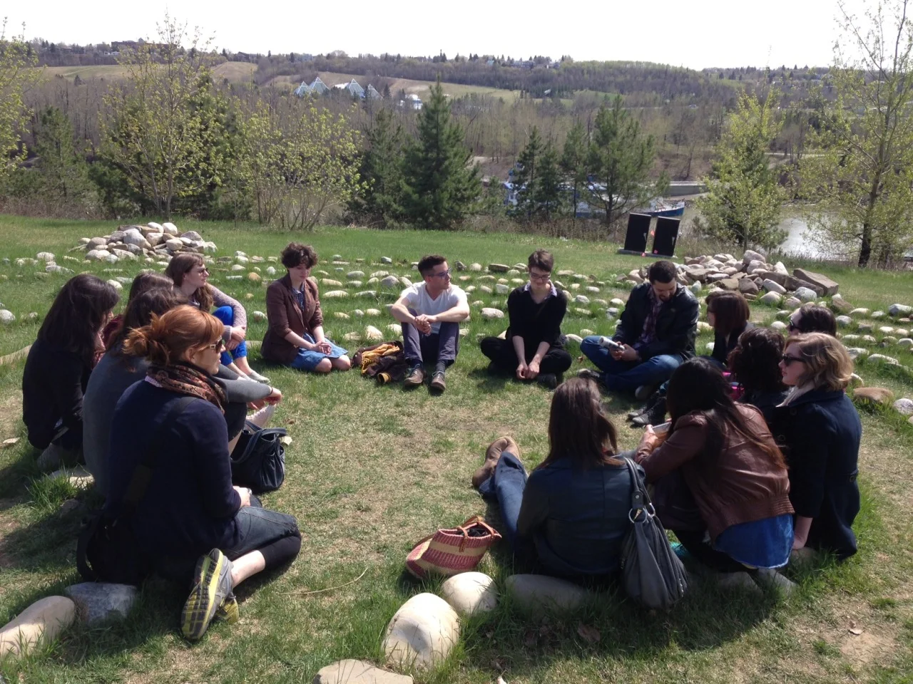 Interns discussing Lea Dorion’s Turtle Rock Effigy Labyrinth in Louise McKinney Park, downtown Edmonton. Dorion’s work was created as part of The Works Art & Design Festival in 2010. Just another day at the office!