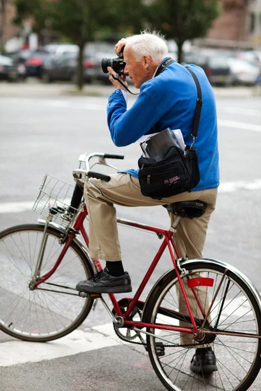 Bill Cunningham on his infamous bicycle