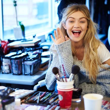 gigi hadid in the chair.jpeg
