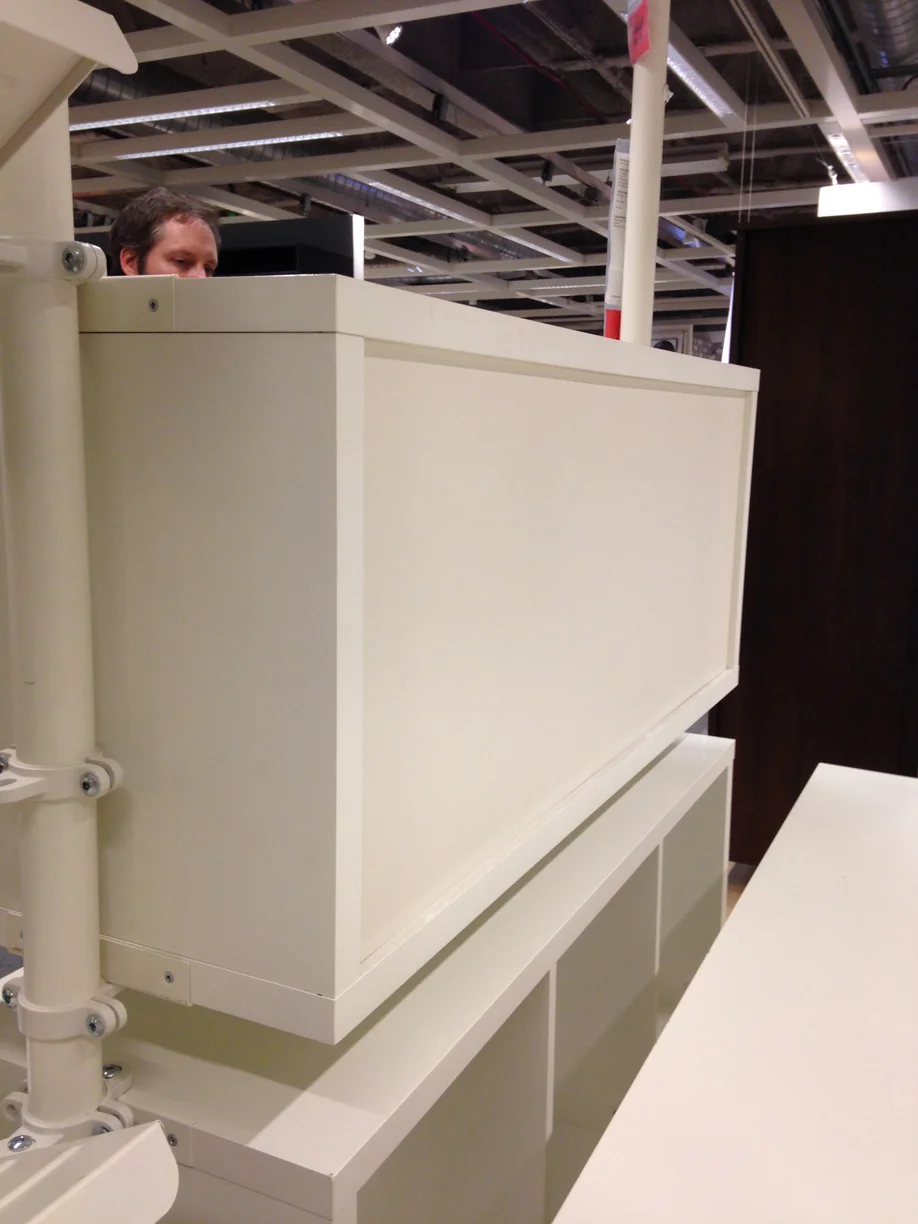    Sara was not very excited about the abundance of plain white with the Ikea Stolmen components we were installing in her bedroom. Fortunately, she had some cool fabric laying around that would make an attractive new back panel.   