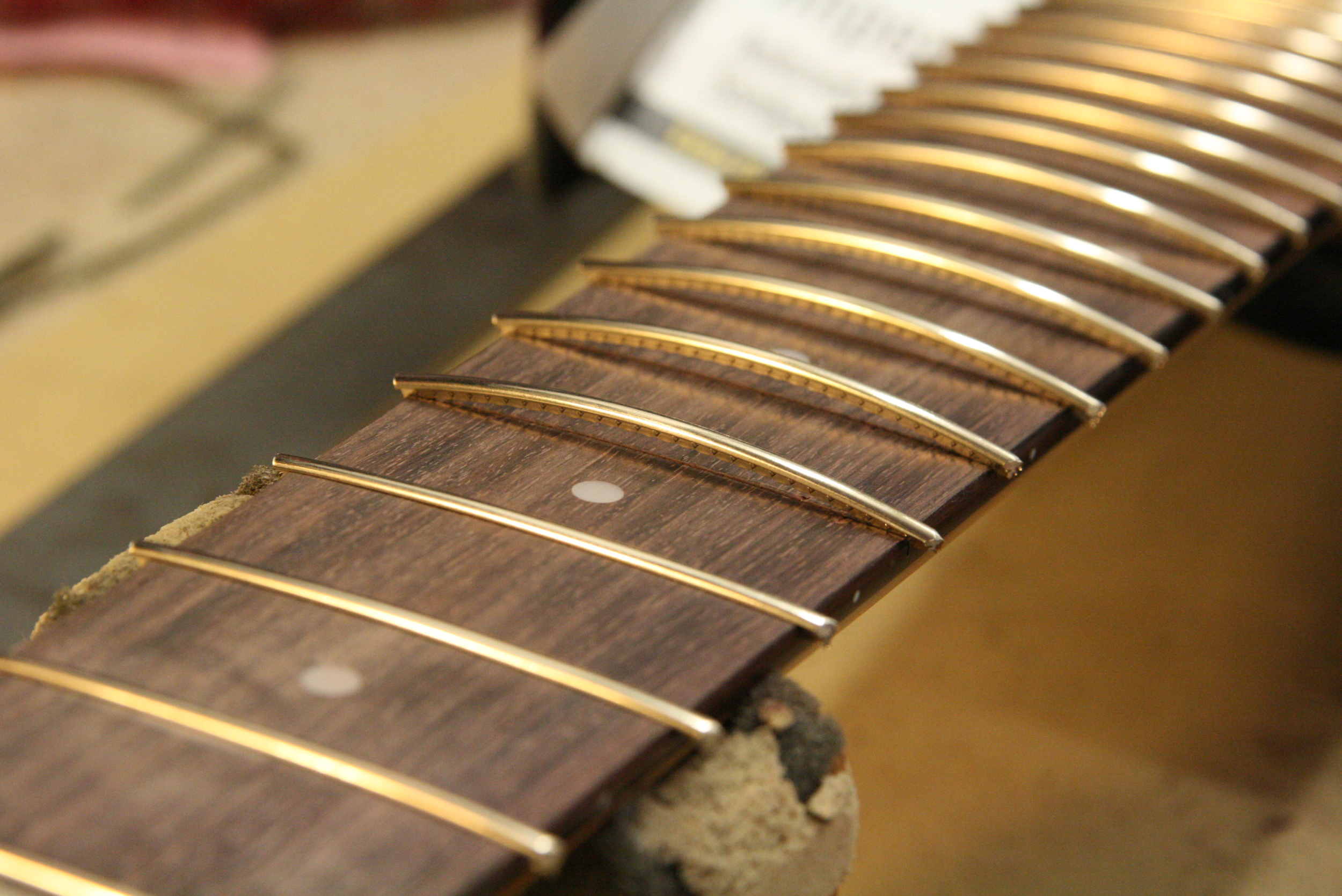 Refret of an 8-string Ibanez Guitar