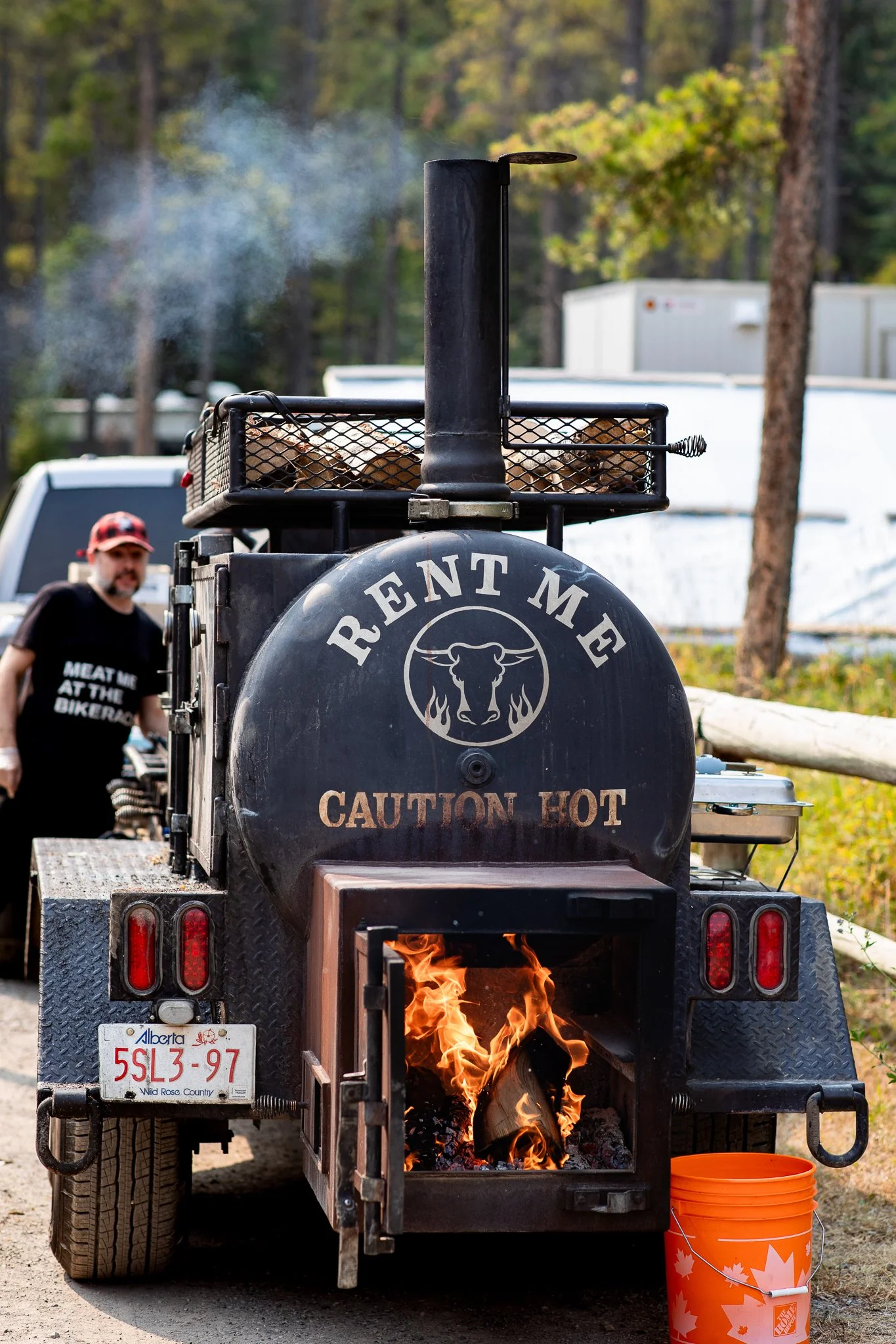 Rollin Smoke BBQ serving dinner at an outdoor wedding reception at Trappers Hill Lodge near Calgary