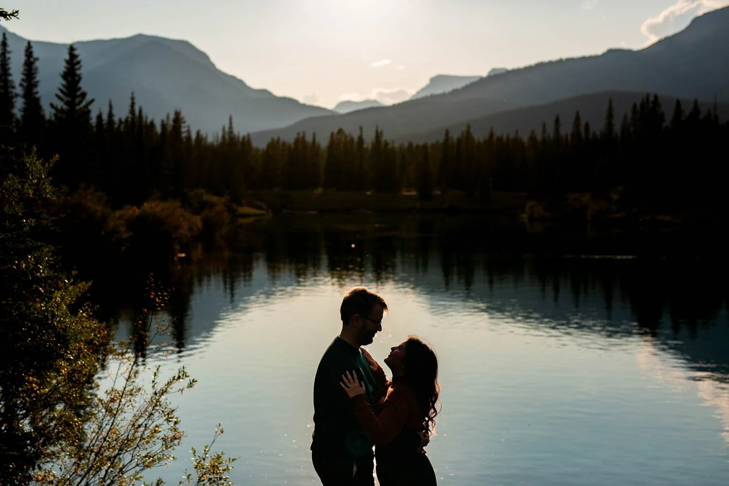 Forget-Me-Not Ponds engagement session in Kananaskis with mountain scenery and editorial style