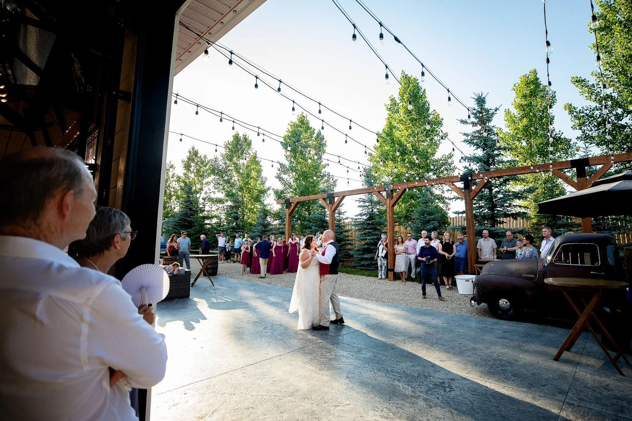 Family and friends celebrating with the couple at an intimate Calgary wedding