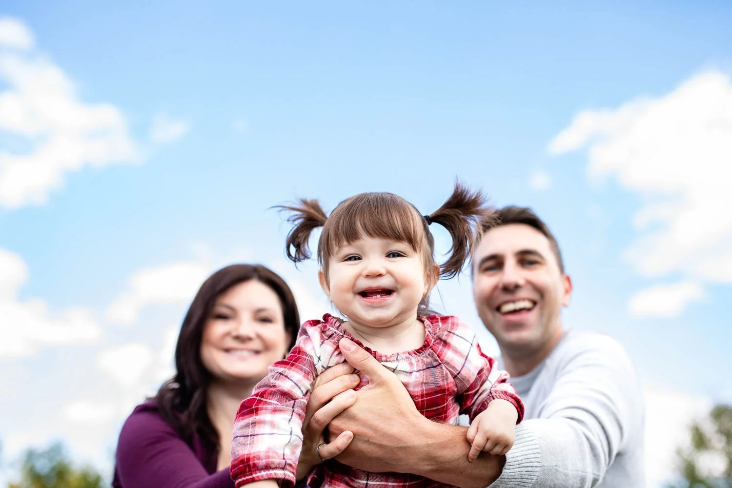 Documentary-style family photography in Calgary capturing natural connection and candid moments.