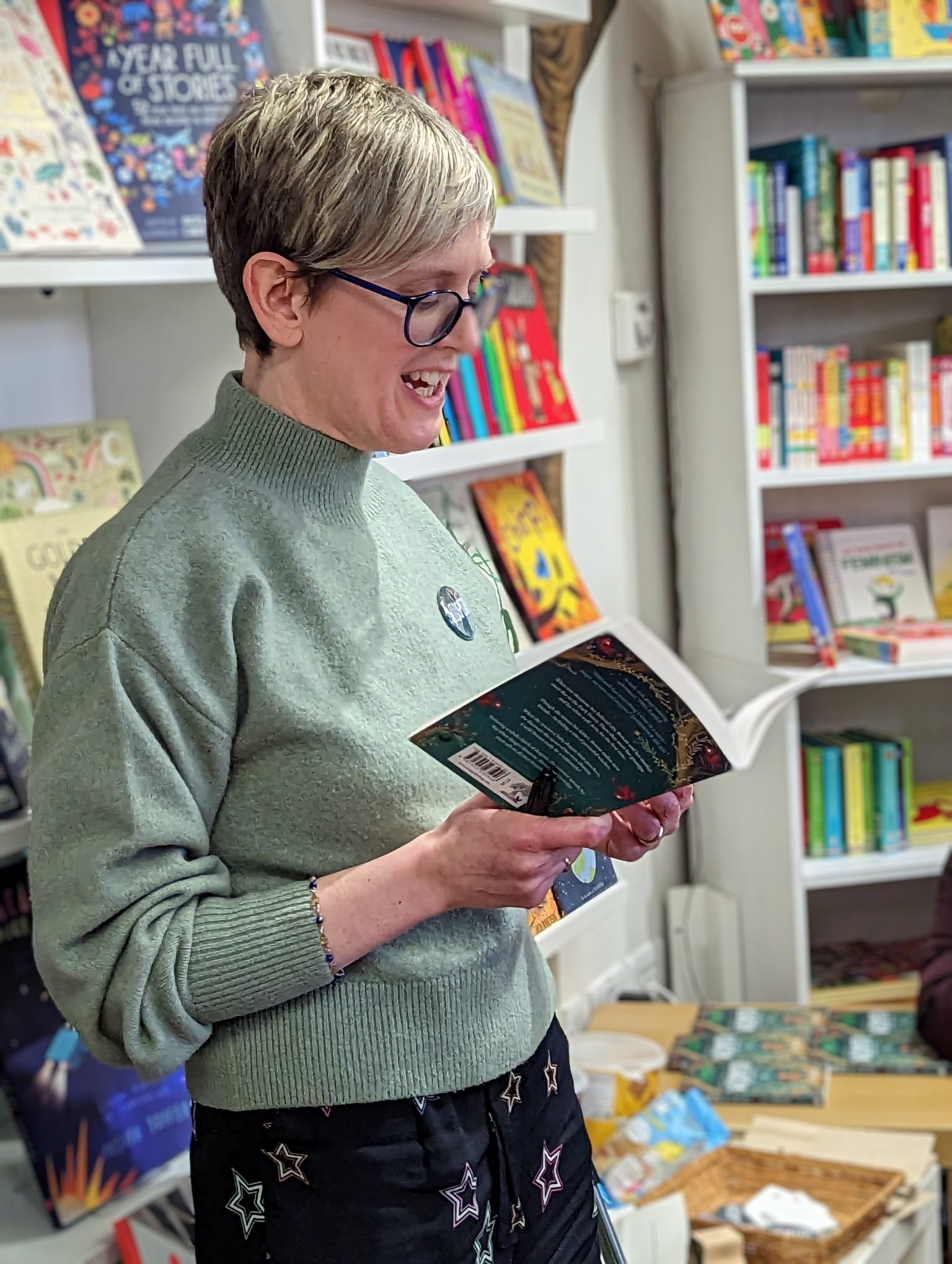 Liz reading in bookshop.JPG