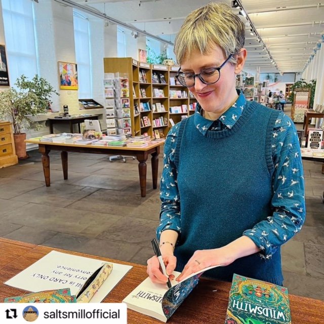 Liz signing books in salts mill.JPG