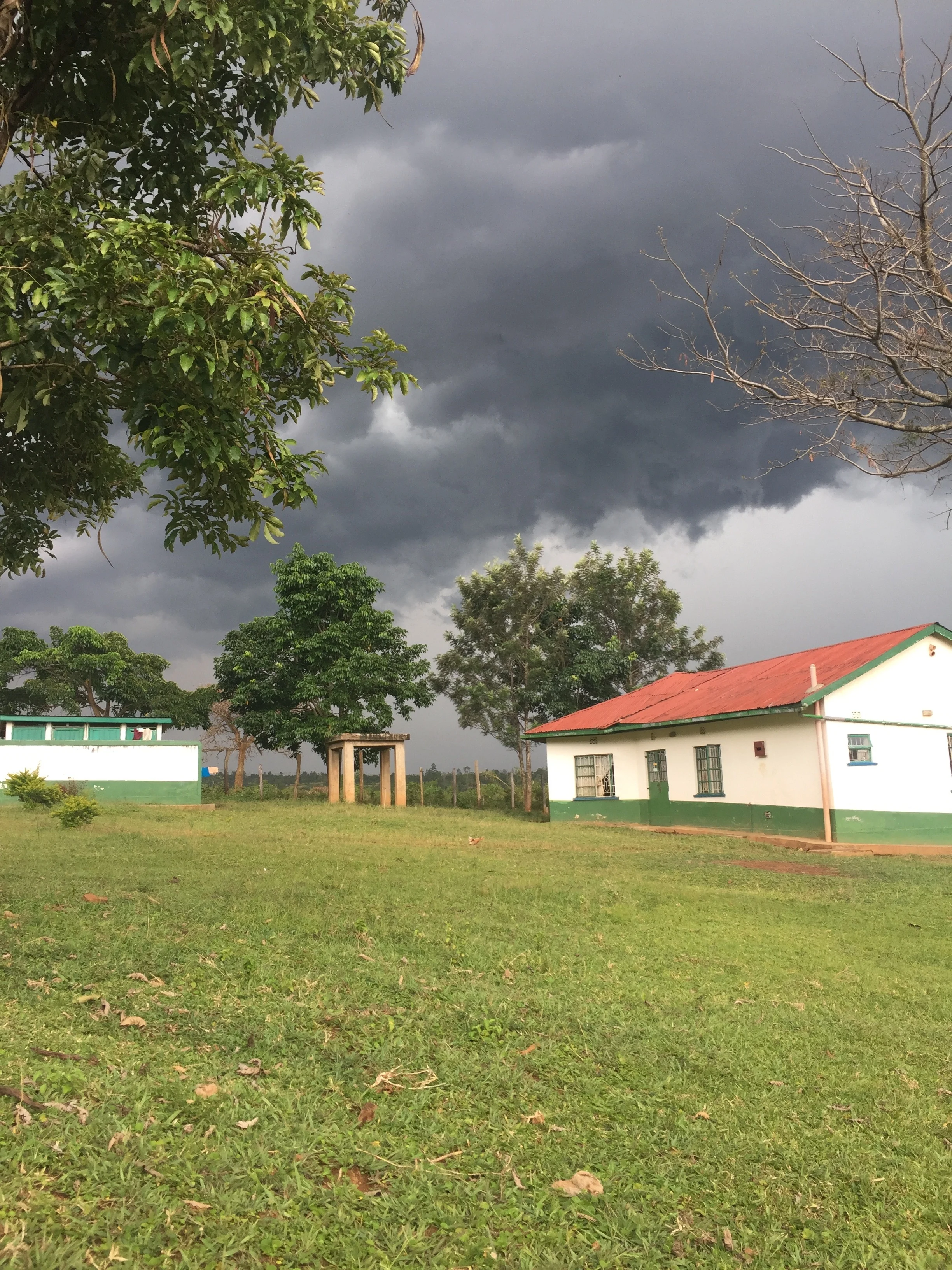 Sitting outside our children's home watching a storm roll in.