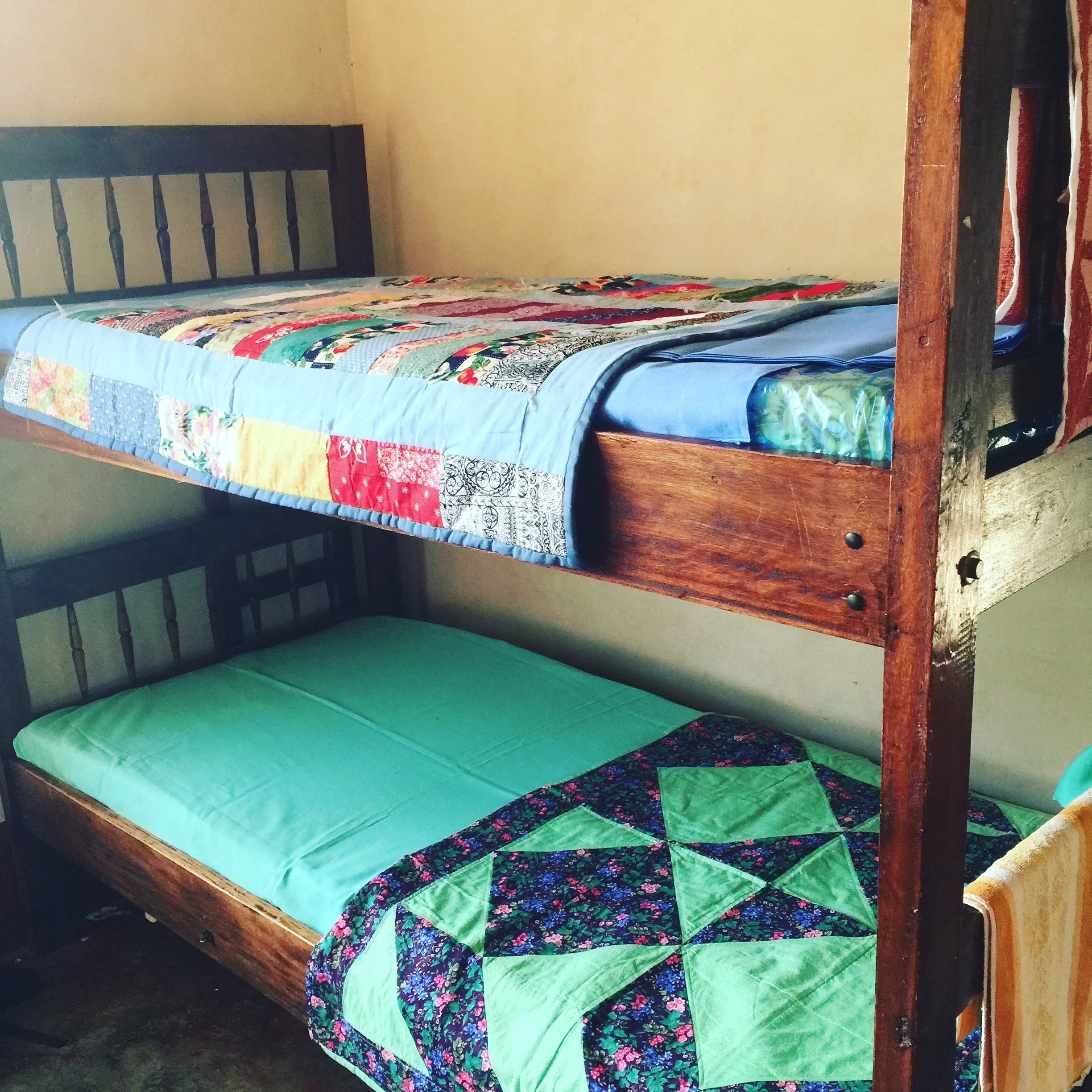 Baby and Pamela's new bed that the older girls fixed up for them.