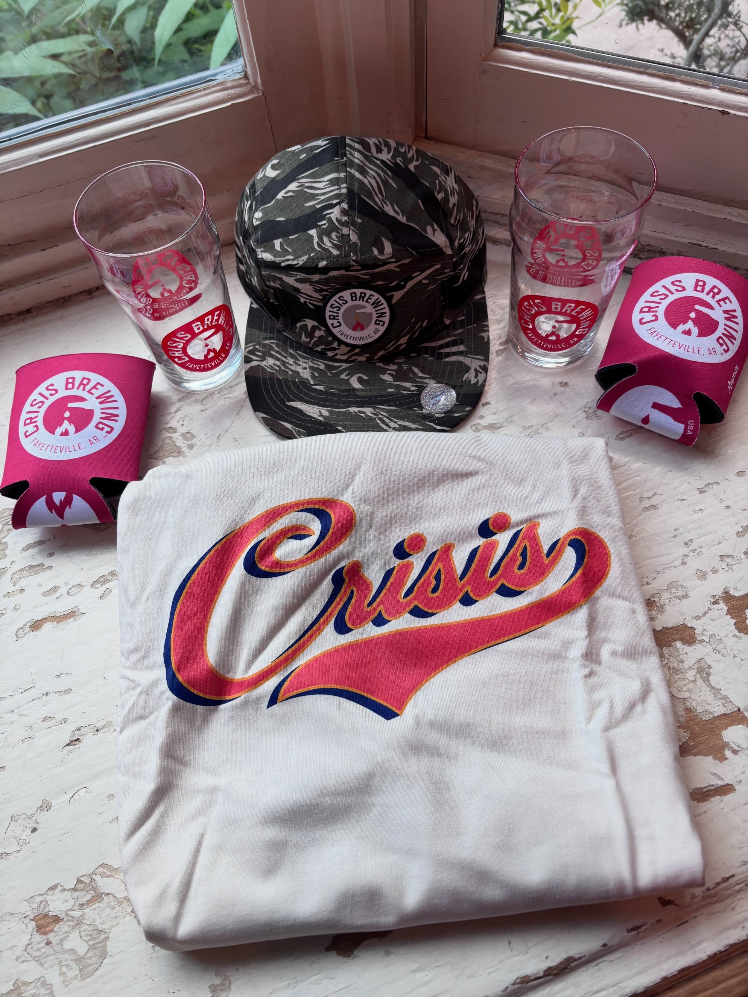 We love @crisisbrewingco !! Yet another awesome local gem that makes our community so unique and amazing! 

The Crisis package in our Winetopia auction includes:

$50 Gift Card 
Crisis Tee (L)
Crisis Hat
Two Pint Glasses
Two Koozies 

And that Tee is