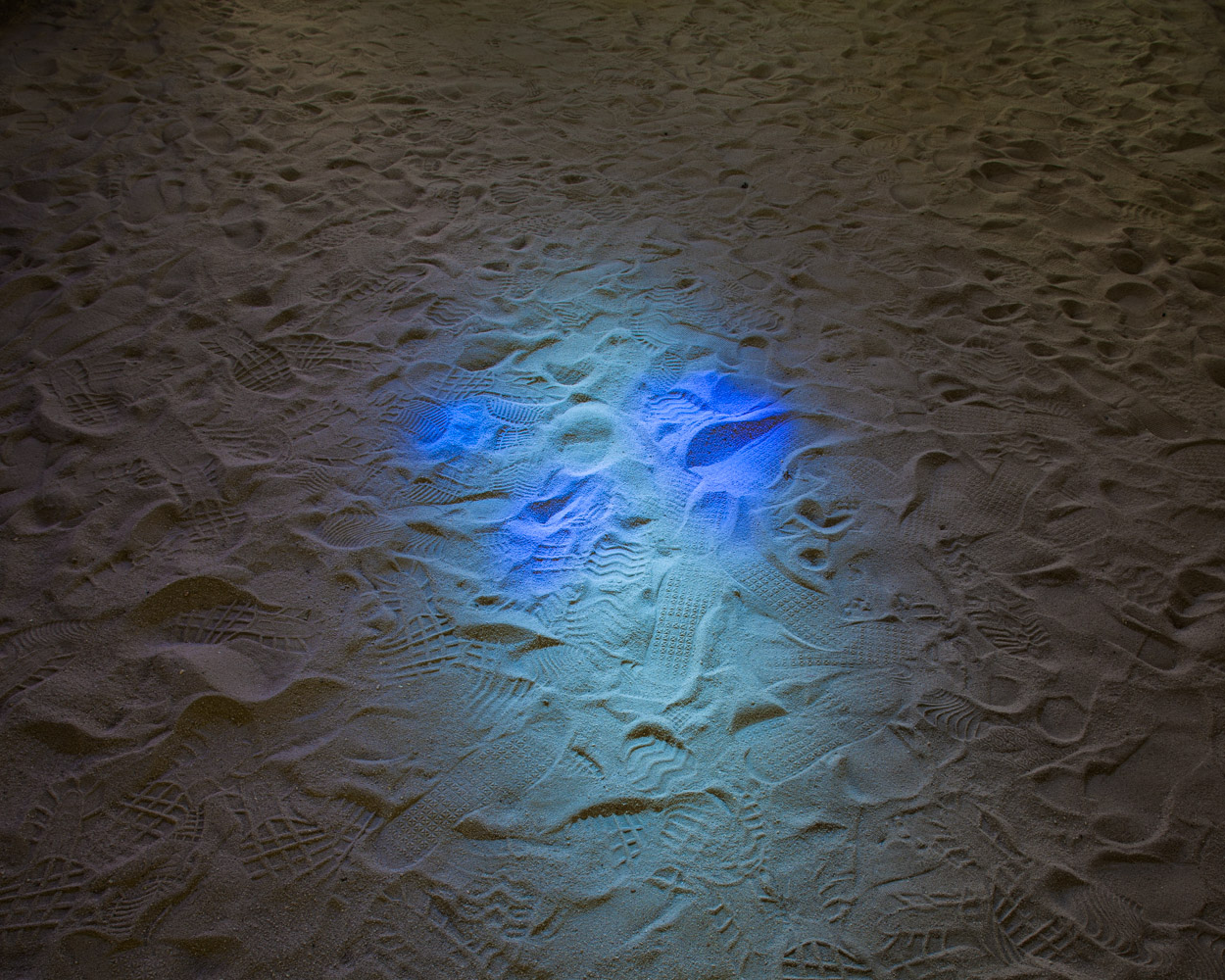 Light On Sand Covered Floor