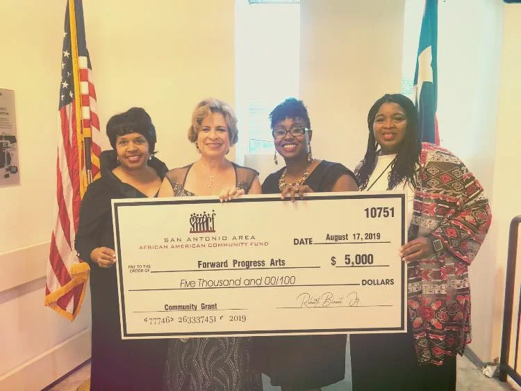 big check with laticia.jpg