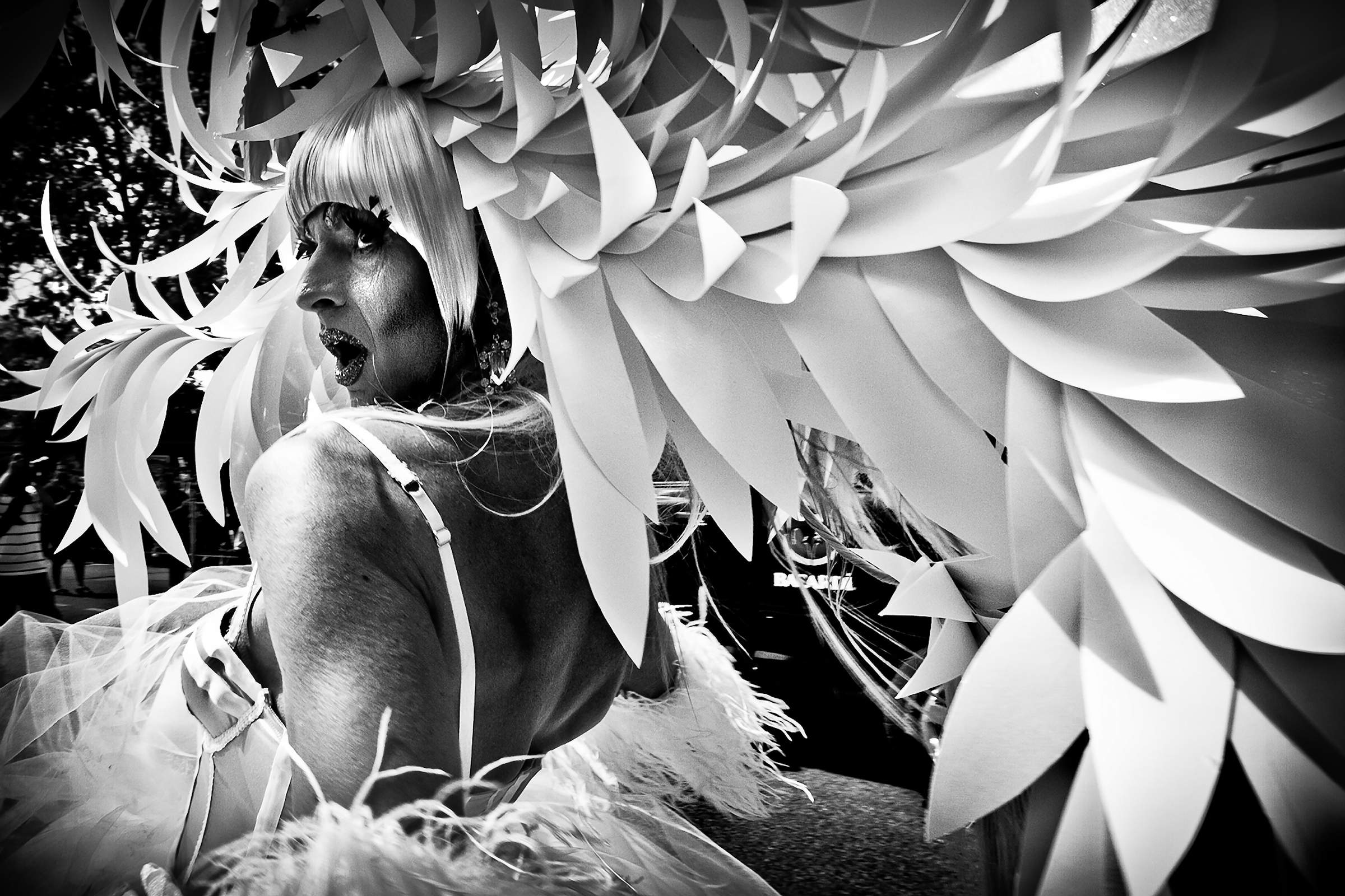 Female impersonator Guy Labrecque, known for his elaborate head pieces, marches in the Vancouver Pride Parade on July 31st, 2011.