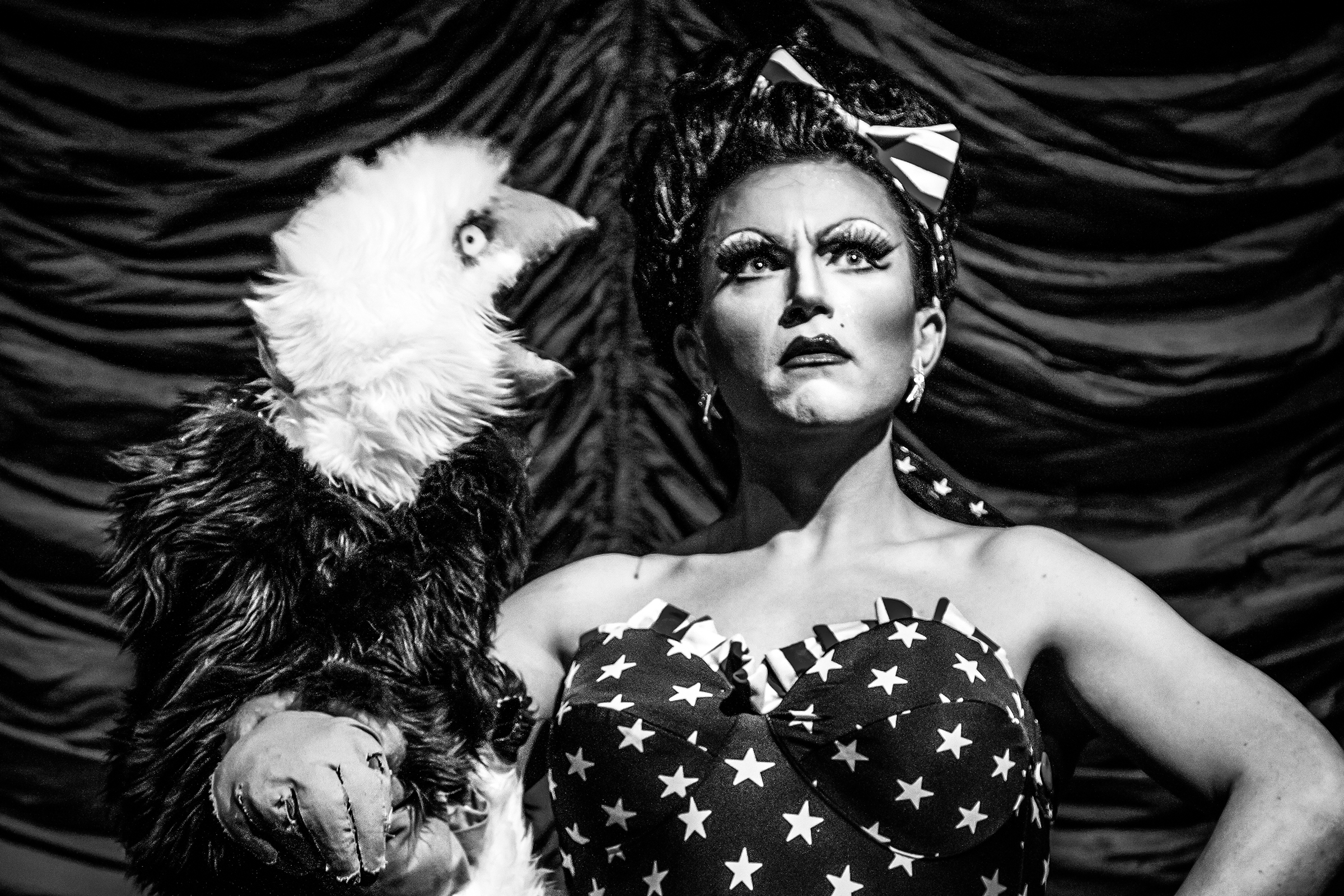Ben Delacreme gets lectured by a bald eagle during Freedom Fantasia, "a liberty-encrusted, justice-soaked, apple-pie-scented pageant of patriotism," at The Triple Door on July 3rd, 2012, in Seattle. The popular drag performer went on to win Miss Congeniality in the sixth season of Logo's Rupaul's Drag Race in 2014.
