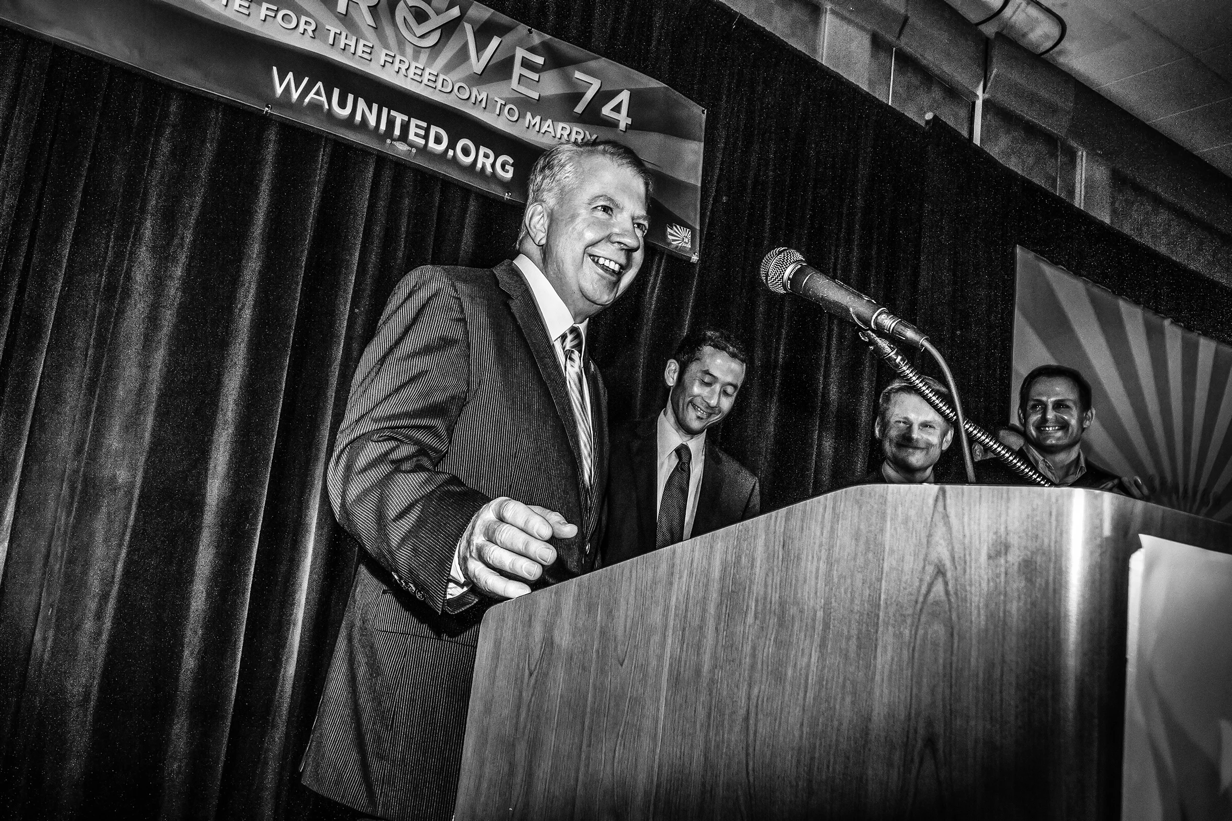State senator Ed Murray smiles after his partner Michael kissed him on stage at a Washington United for Marriage victory party in Seattle after it was announced that voters had approved marriage equality in the state of Washington on November 6th, 2012. Murray went on to be elected mayor of Seattle in the 2013 elections.