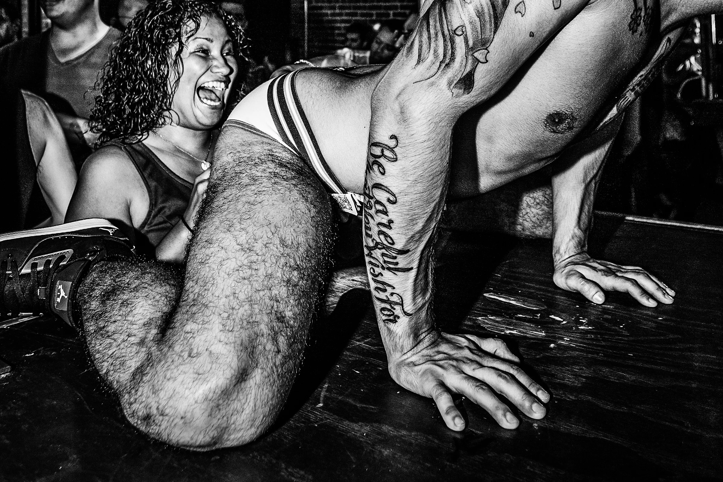 A go-go boy entertains a patron at R Place on September 19th, 2014, in Seattle.