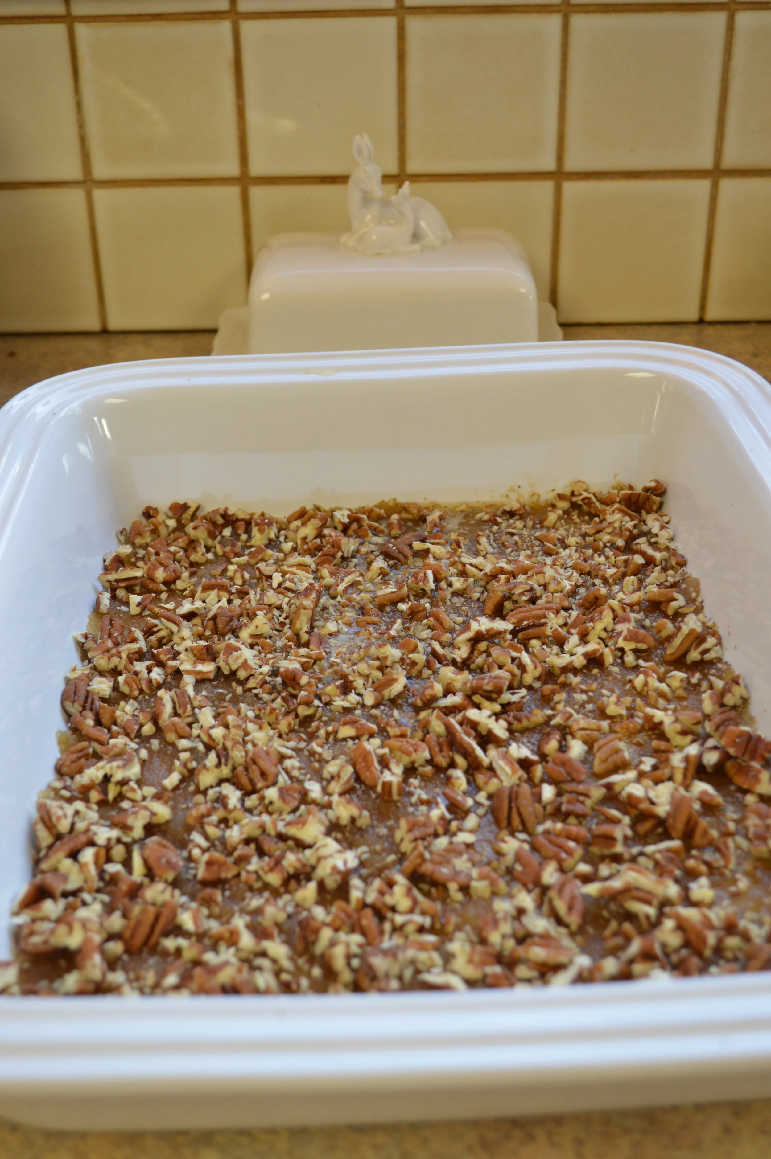 Melted butter, brown sugar, and chopped pecans