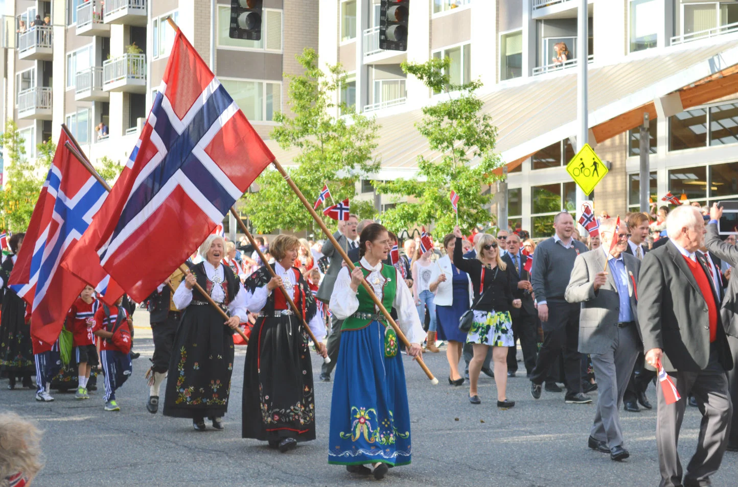 Beautiful bunads...each region of Norway has its' own colors and design.