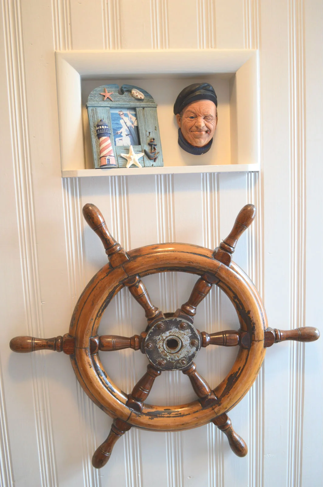 Bosson captain head inherited...old captain's wheel from an antique sale.