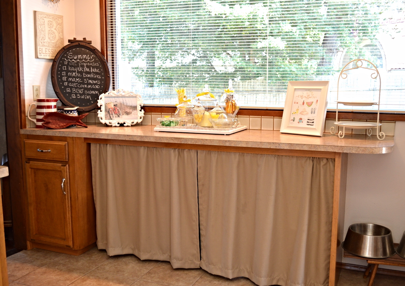 I added these curtains so I could store things used for entertaining under the eating bar...