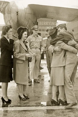 Louie, hugging his mother,upon his release...via google