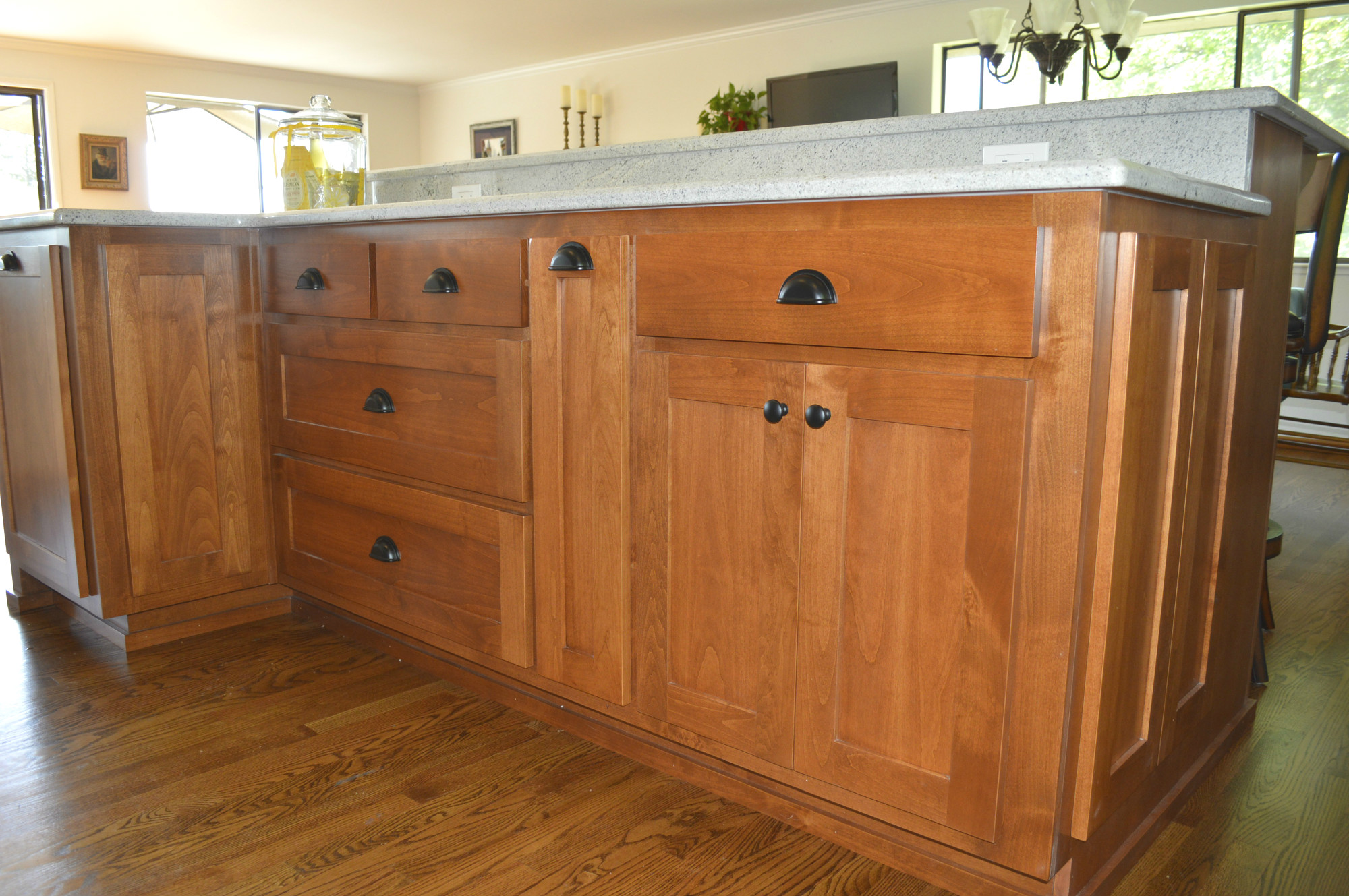 New floor boards added and whole wood floor refinished, along with pull out cabinet for garbage...
