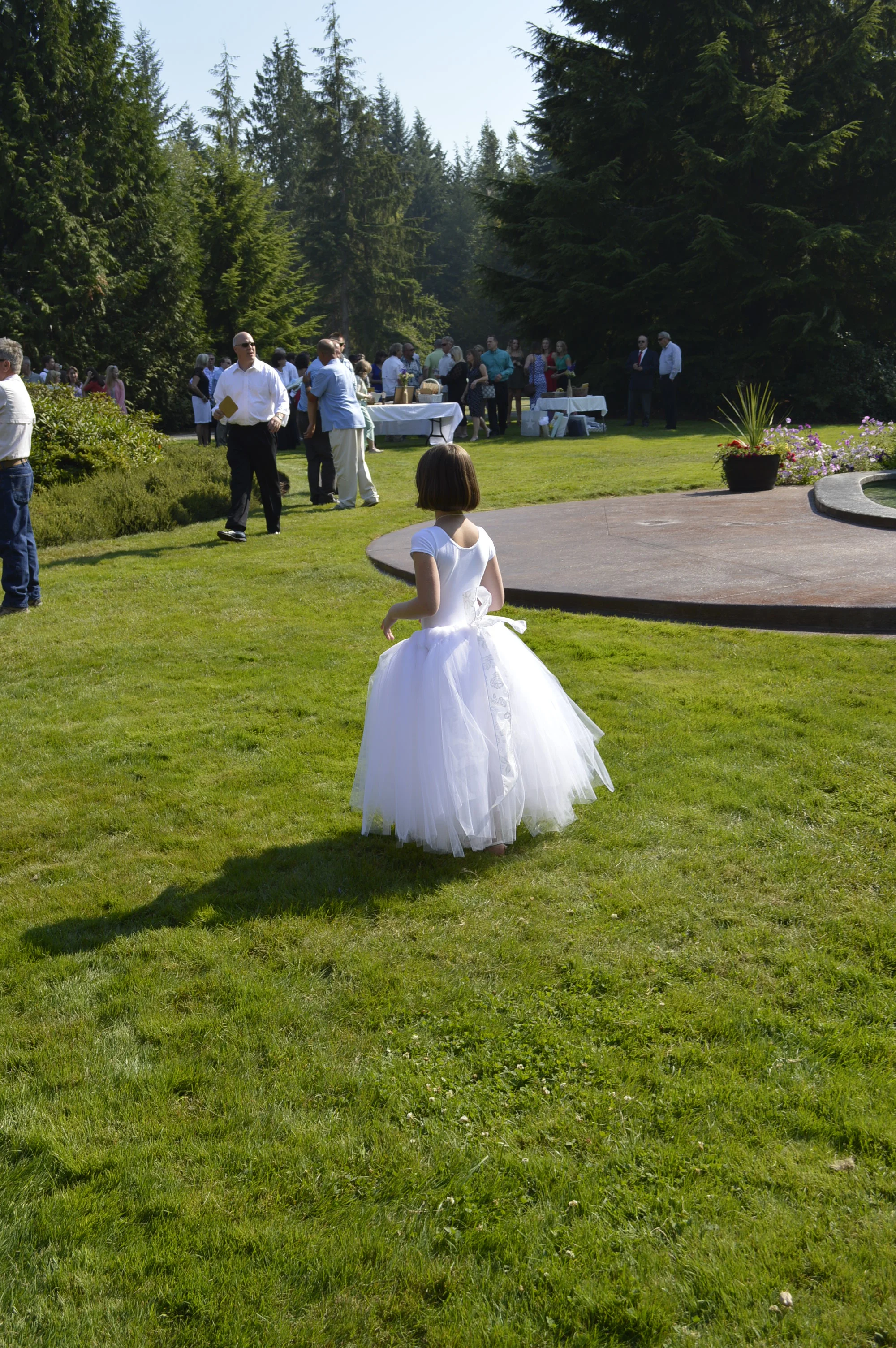 The flower girl...there actually was another younger flower girl...who apparently didn't cooperate for the wedding ceremony...I saw her afterwards with her tulle skirt off...too funny!