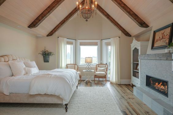Master bedroom...love the open beams and fireplace! (pinterest)