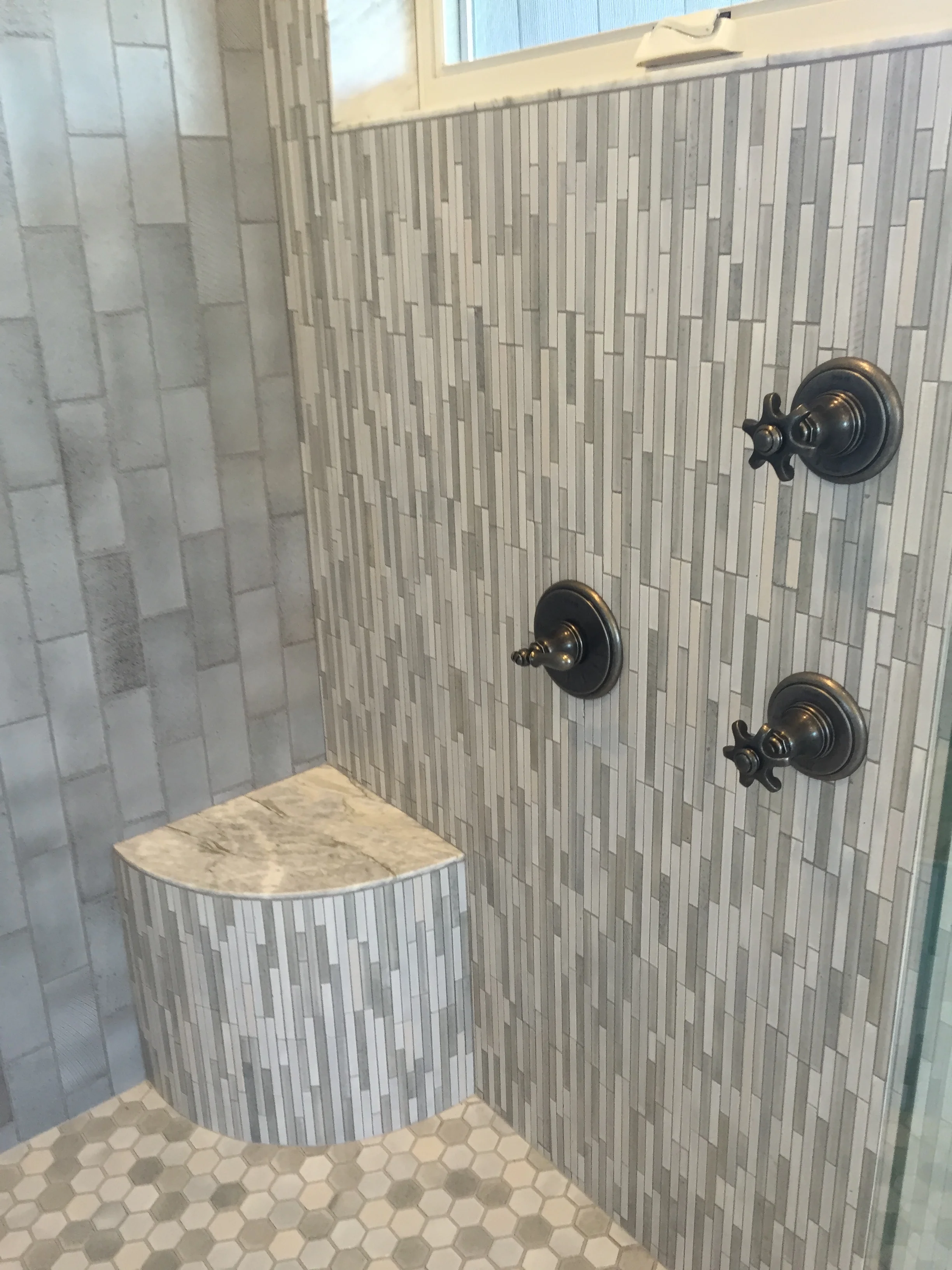 Master shower...look at all the tile patterns!