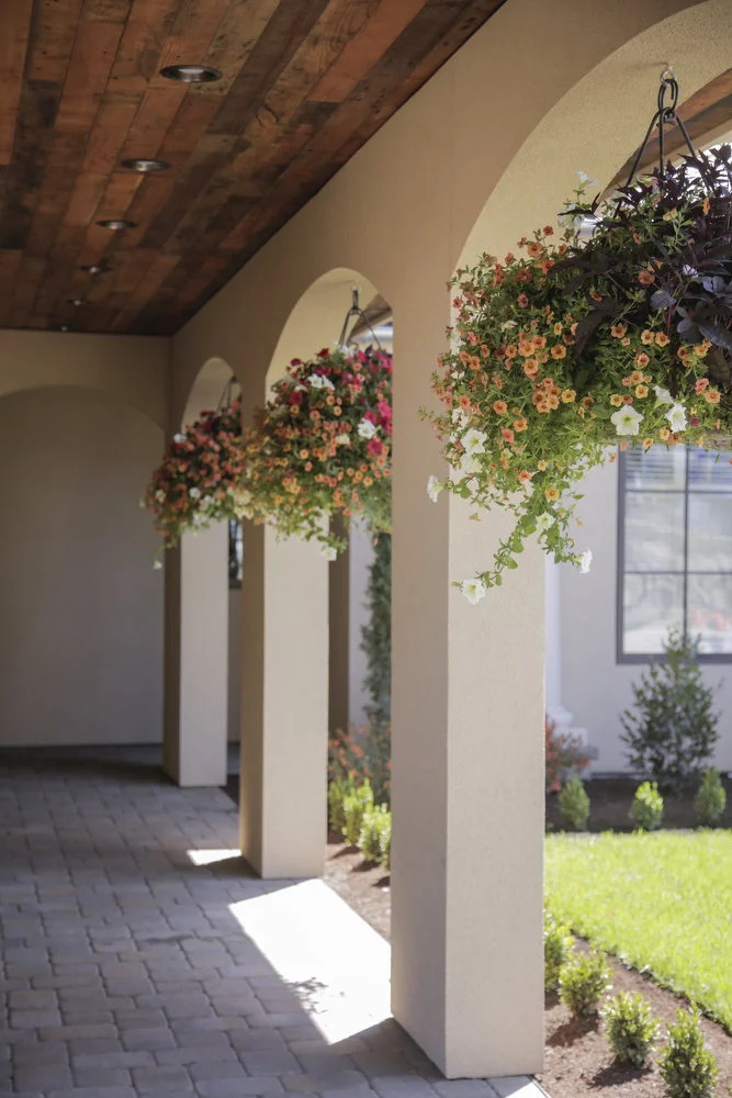 Charming walkway from the garages and stone barn to the house...(Photo source Oregon Live)