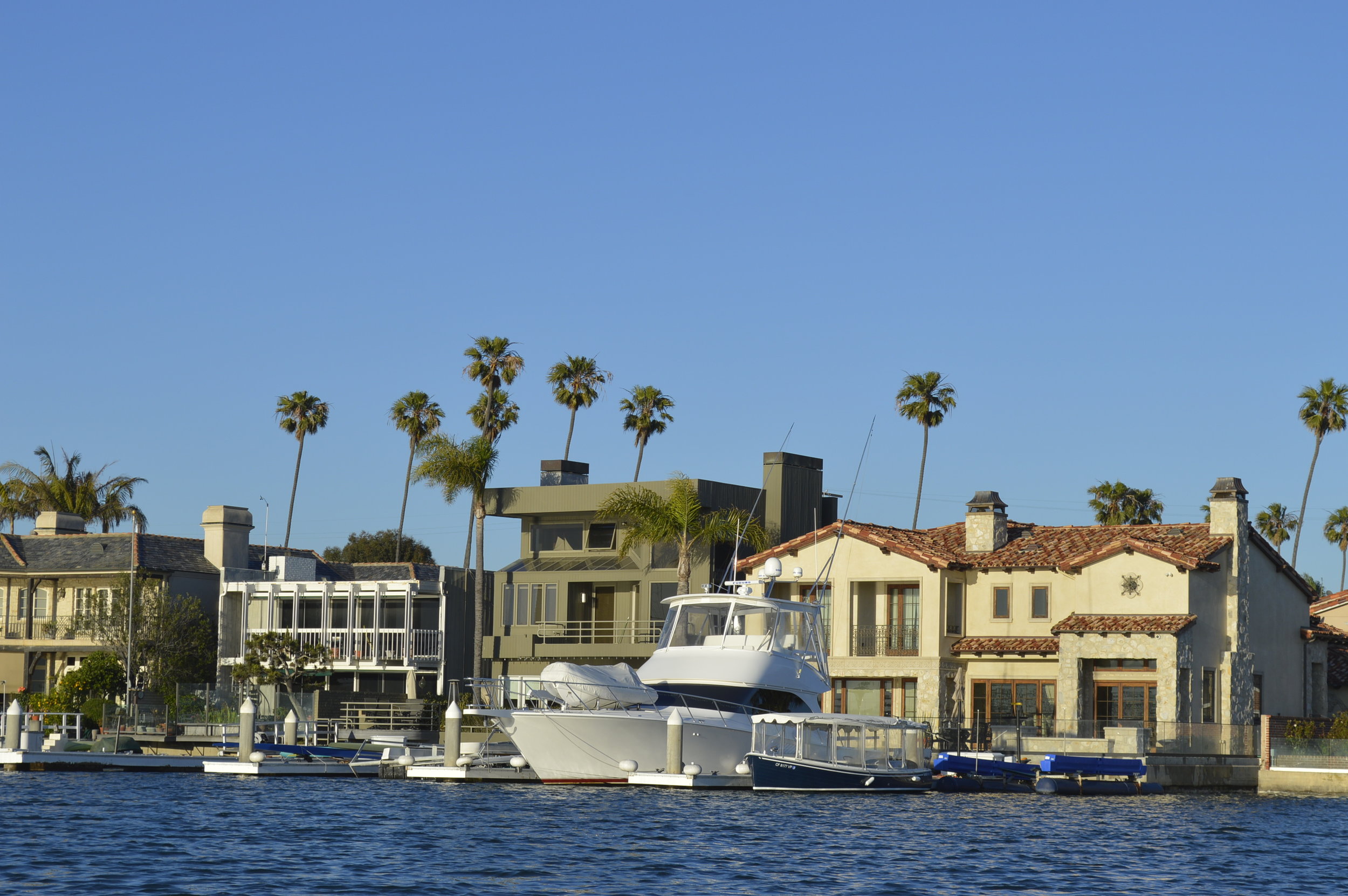 One side of the canal had houses with docks and boat slips...