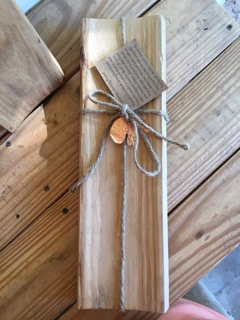 Serving board with copper bear and instructions