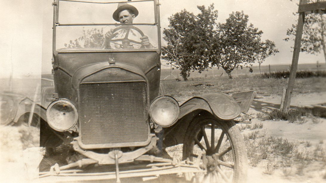Grandpa Howard and his "bran-new green-spring wagon, with the wheels striped red and yeller."