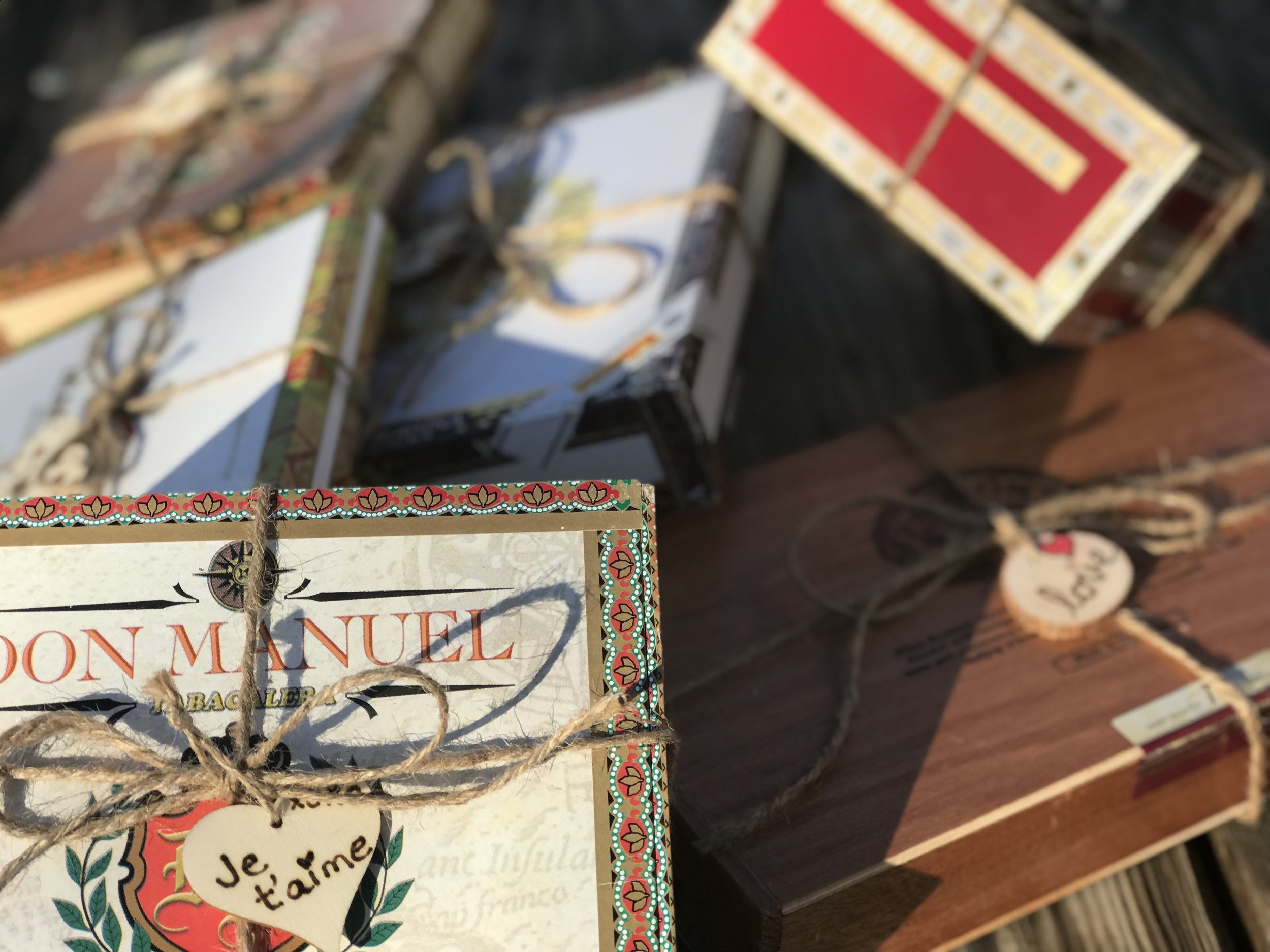 Chocolate Cubanas-pretzels dipped in homemade caramel and chocolate to look like cigars in traditional cigar boxes. 
