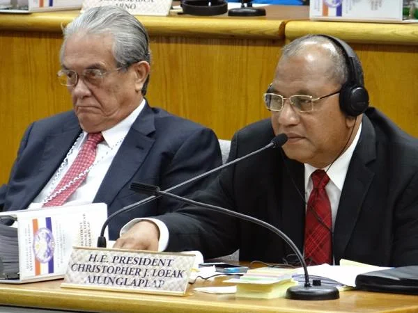 Tony Debrum (Minister in Assistance to the President, pictured left ) with President Christopher Loeak.