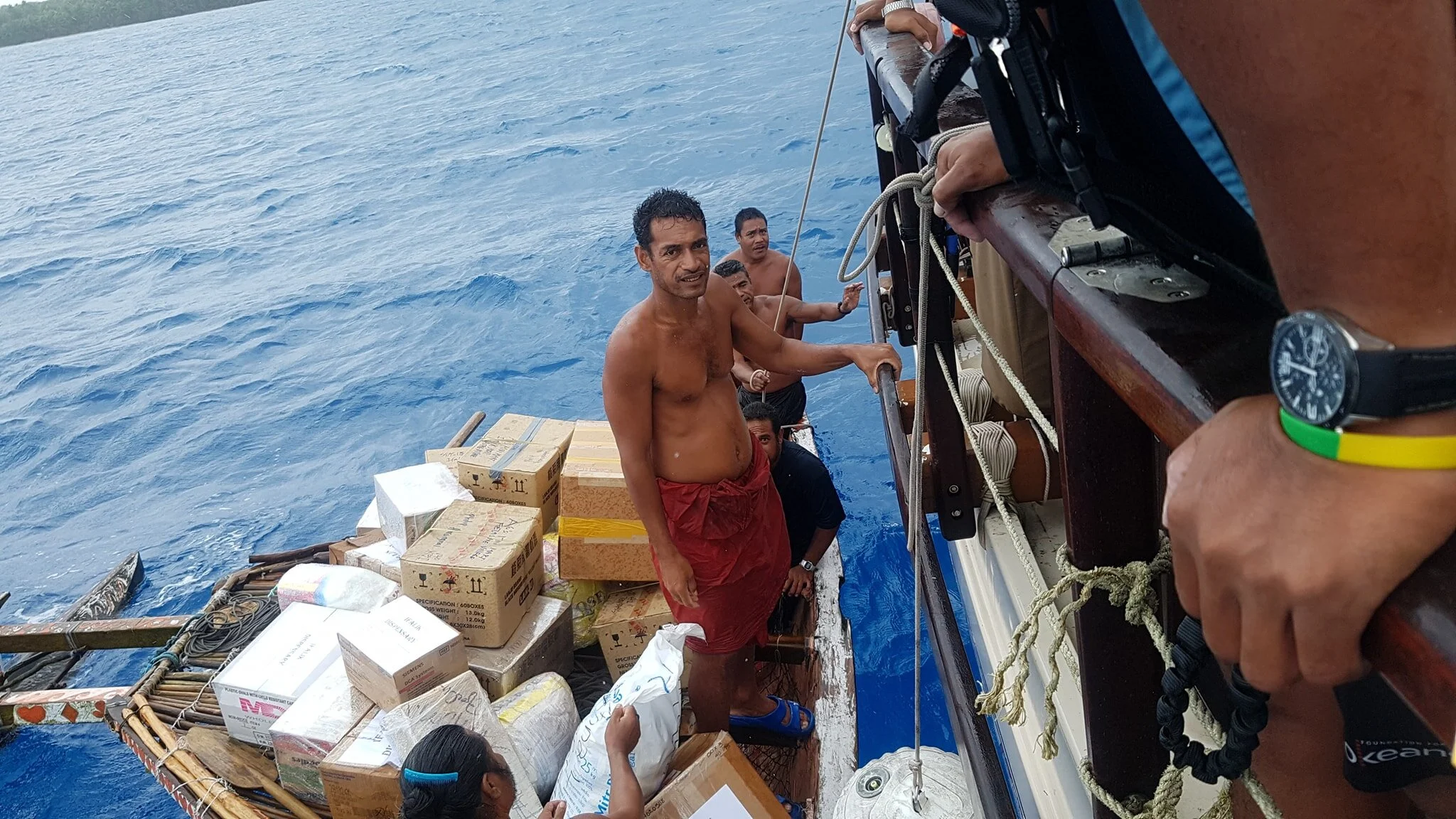 Above: Okeanos crew delivering medical supplies on the fossil fuel-free Vaka Motu to Ifalik atoll. Photo Credit: Iva Vunikura
