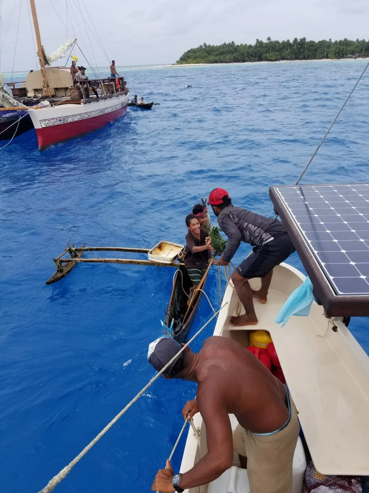 Above: Okeanos Ambassador and Okeanos Waa’qab offloading relief goods in Yap neighboring islands, who greeted the Okeanos crew with fresh fruits. Photo Credit: Iva Vunikura