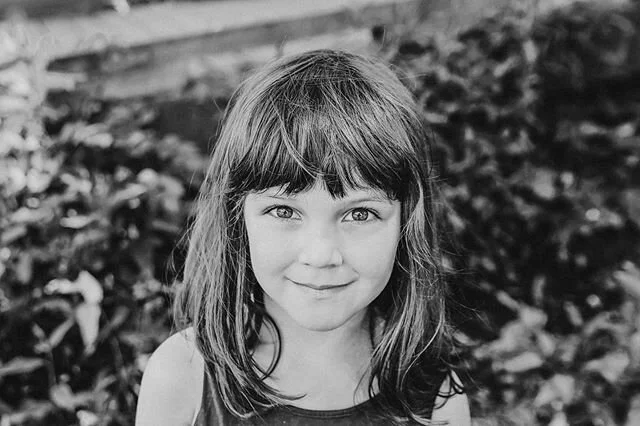 I love this shot.  Her piercing eyes and innocent smirk is #everything
.
.
.
#nanciimagery #childphotographer